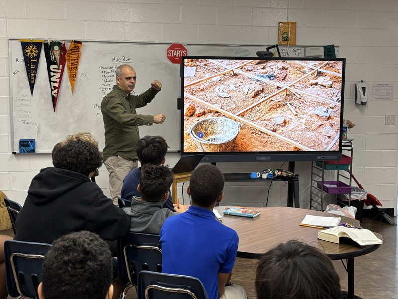 Pastor Andrew Raduly presenting about Egyptian archaeology to the team