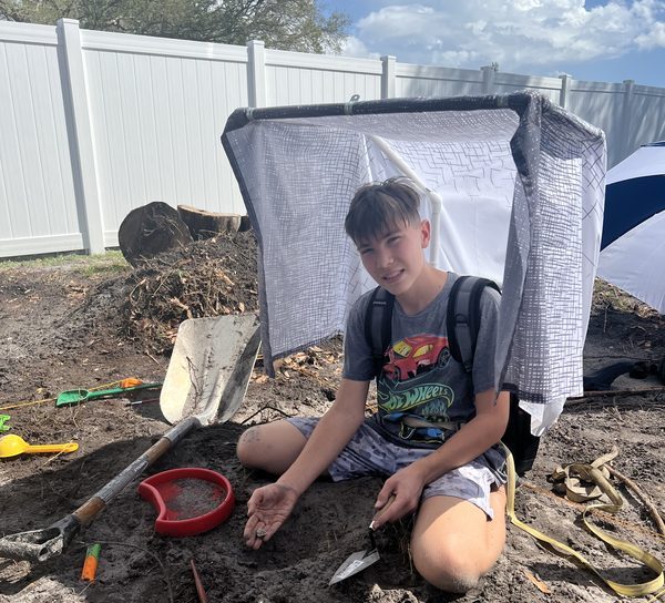 Excavating with Prototype 2 providing cover