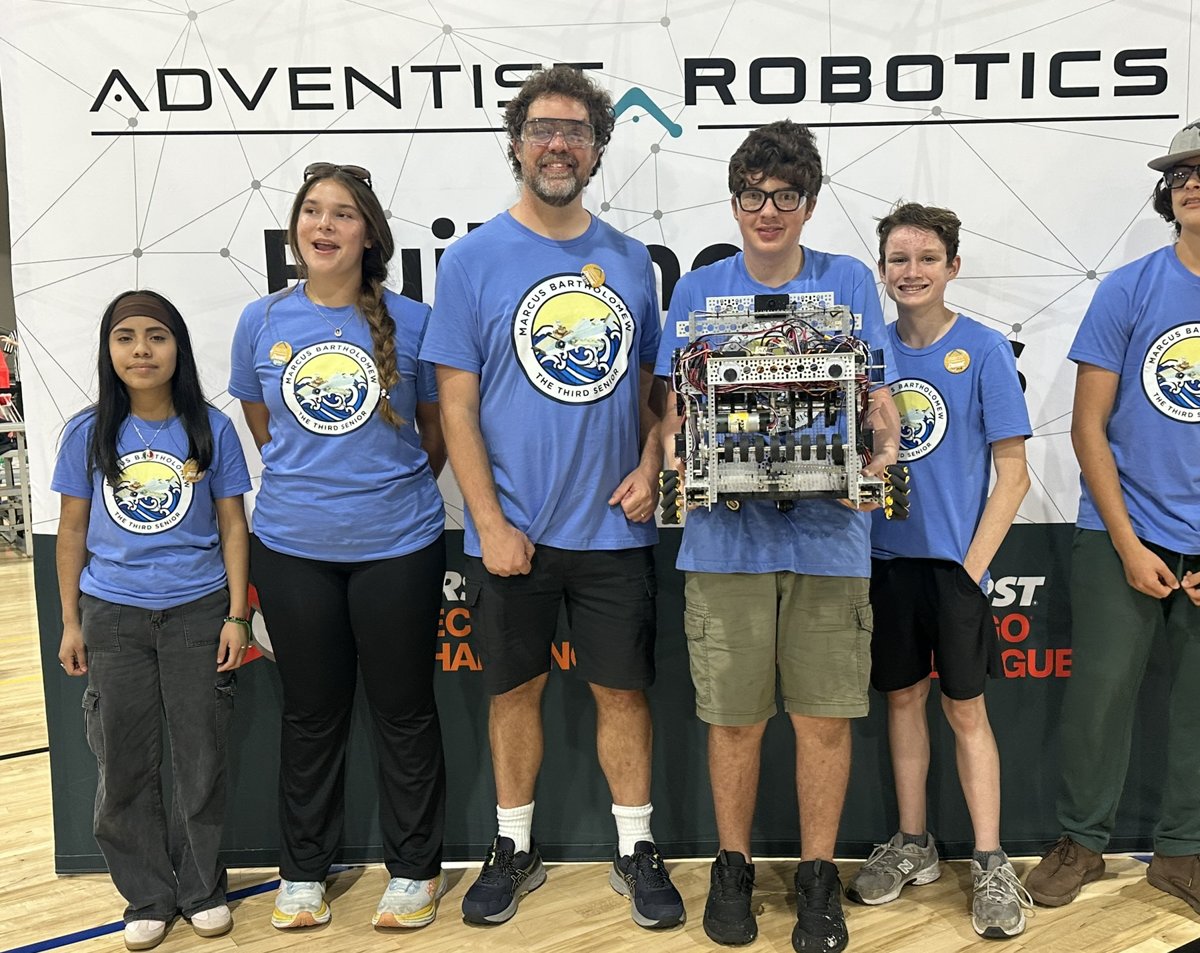 32314 Marcus Bartholomew the Third Senior team and robot after the League Championship